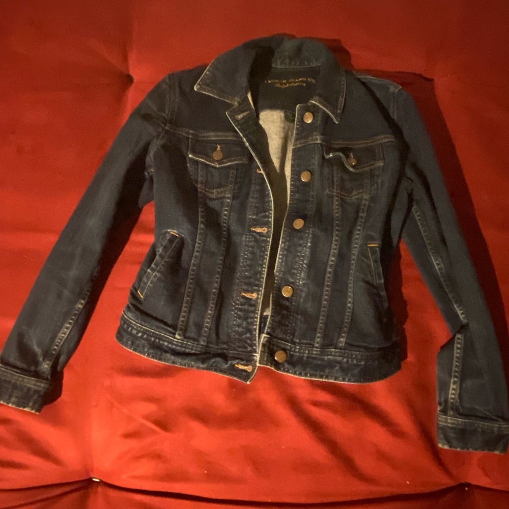 Jean jacket. Woman’s small, girls large